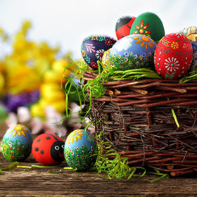 Easter eggs and natural wooden country table, background and texture