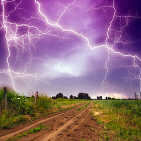Rural road and lighting storm