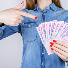 Give bill tax credit interest pawnshop earn atm investor investment people person debt economy concept. Cropped close up photo of lady's hands with red manicure nail holding money isolated background