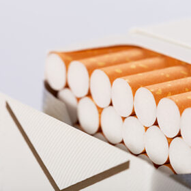 Closeup picture of box full of cigarettes