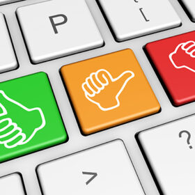 Business quality service customer feedback, rating and survey keys with hands thumb up symbol and icon on computer keyboard.