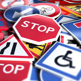 Perspetive view of numerous french traffic road signs. Concept image for background, 3D illustration
