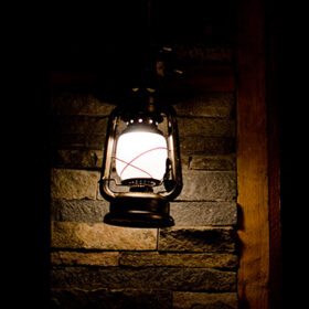 Shining lantern in complete darkness